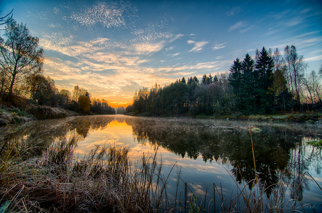 Sunrise at river Vantaa on a cold morning